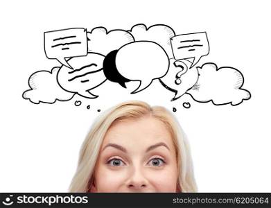 curiosity, communication and people concept - happy young woman or teenage girl face with text bubble doodles