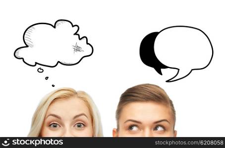 curiosity, communication and people concept - happy young women or teenage girl faces with text clouds