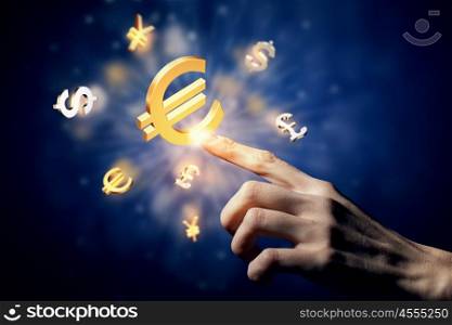 Currency concept. Hand touching money currency symbol with finger