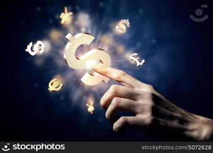 Currency concept. Hand touching money currency symbol with finger