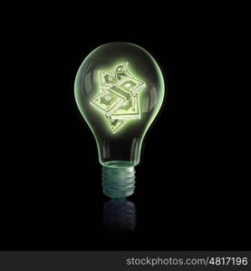 Currency concept. Light bulb with money banknotes on dark background