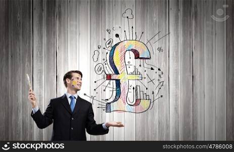 Currency concept. Young handsome businessman holding pound symbol in palm