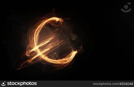 Currency conceptual image. Euro currency glowing symbol on dark background