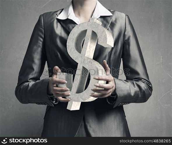 Currency rate symbol. Close up of businesswoman and dollar symbol in her palms