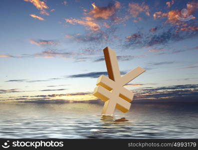 Currency symbols floating on blue sea waves