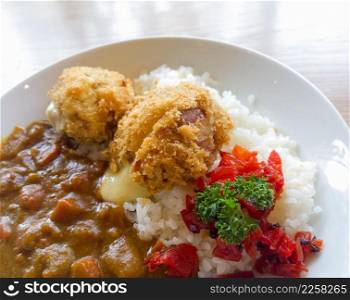Curry with rice Japanese style on wooden table