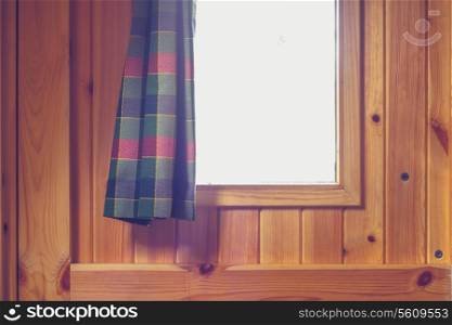 curtain and window in wooden cabin