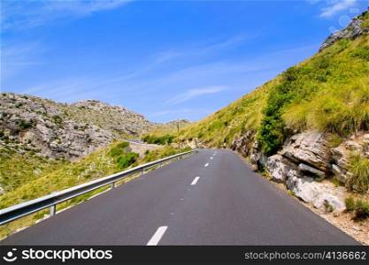 curve of road in mountain with Pollensa view in Mallorca balearic island
