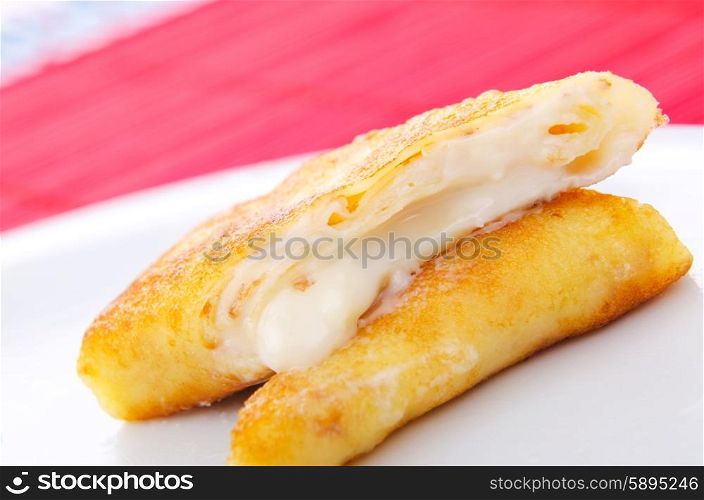 Custard filled pancake in plate