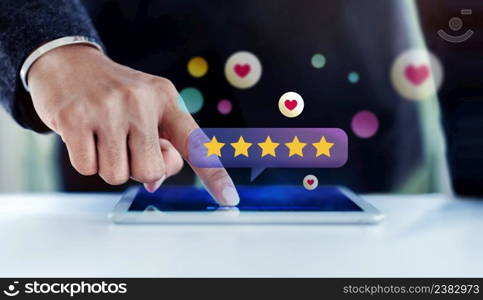 Customer Experiences Concept. Closeup of  Businessman Using Digital Tablet to Giving Feedback via the Internet. Positive Review. Client Satisfaction Surveys. Front View 