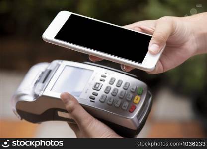 Customer use of mobile phone scan to pay