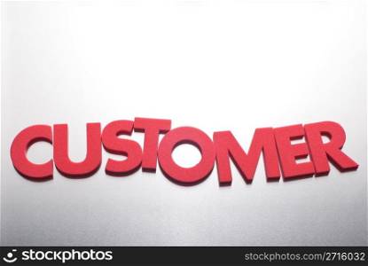 customer word on metal background, part of a series of business words