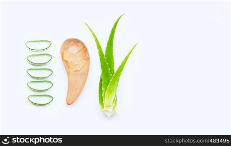 Cut Aloe Vera leaves with slices on white background. Copy space
