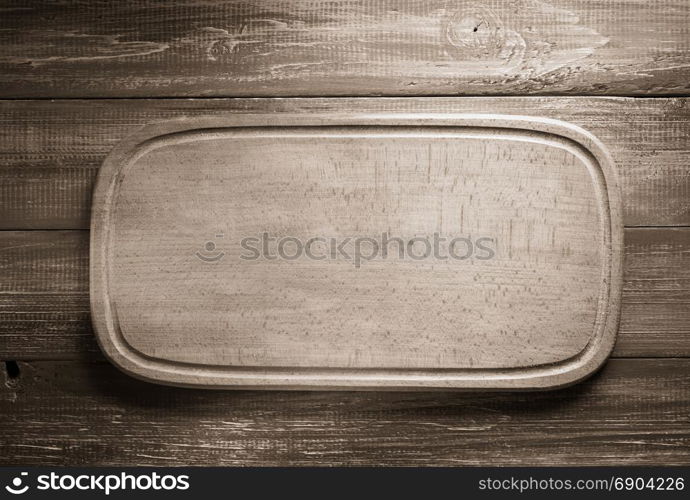 cut board on wooden background