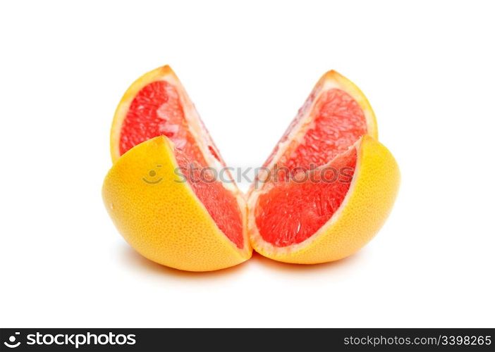 cut grapefruit isolated on white