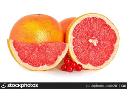 Cut grapefruits and berry viburnum isolated on white background