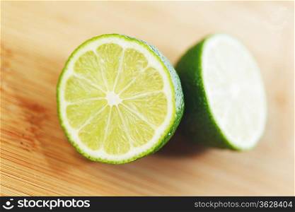 Cut lime on a wooden board