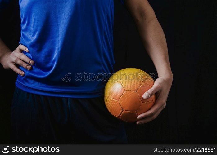 cut out football player holding ball
