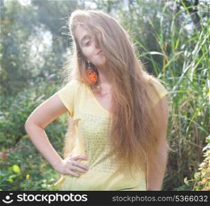 Cute 20s blonde outdoors. Colorized image