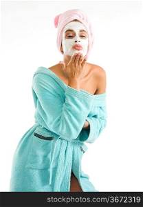 cute and nice girl with face cream mask kissing you