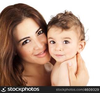 Cute baby boy smiling with mother, closeup on happy family faces, mom and kid having fun indoor, parent holding little child in hands, healthy toddler and mommy portrait isolated on white background