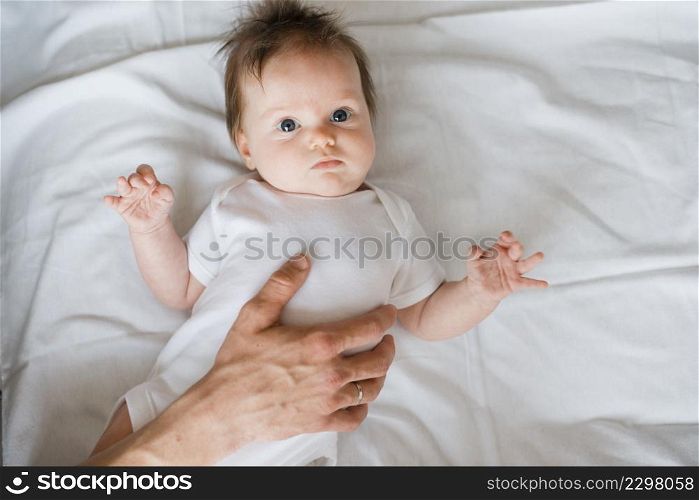 cute baby laying bed