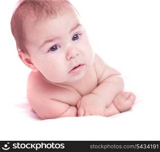 Cute baby lying and isolated on white