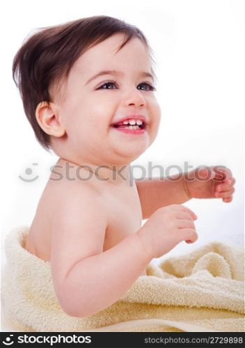 Cute baby smiling while playing with the towel in isolated white background