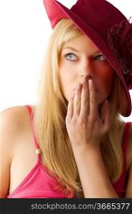 cute blond woman with a red hat covering with hand the lips and looking surprised