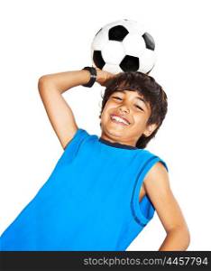 Cute boy playing football, happy child, young male teen goalkeeper enjoying sport game, holding ball, isolated portrait of a preteen smiling and having fun, kids activities, little footballer