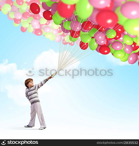 Cute boy with balloons