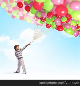 Cute boy with balloons