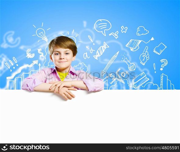 Cute boy with banner. Image of little cute with blank banner against color background