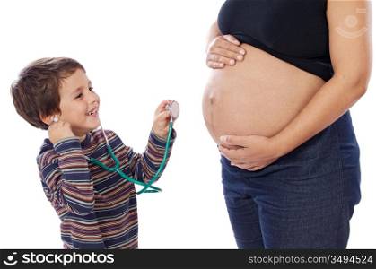 Cute boy with stethoscope and pregnant woman