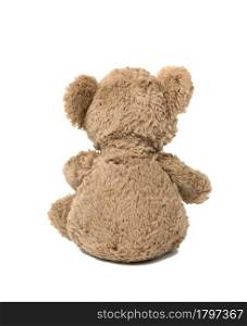 cute brown teddy bear sitting back on white isolated background