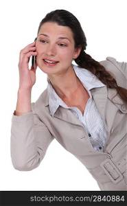 Cute businesswoman on the phone