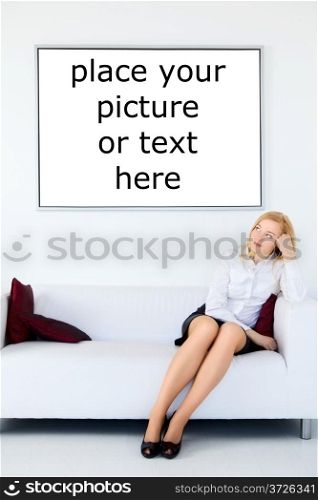 cute businesswoman with long legs sitting on sofa