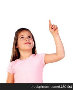 Cute child girl pointing with his finger isolated on white background