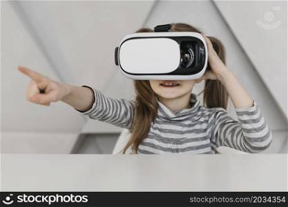 cute child using virtual reality headset