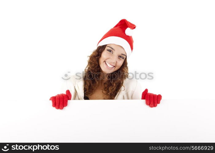 Cute christmas girl grabbing a placard over white