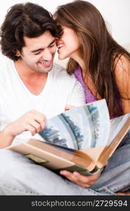 cute couple embracing in living room on isolated white background