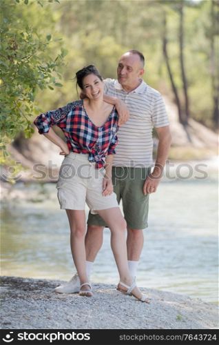 cute couple enjoying weekend in nature