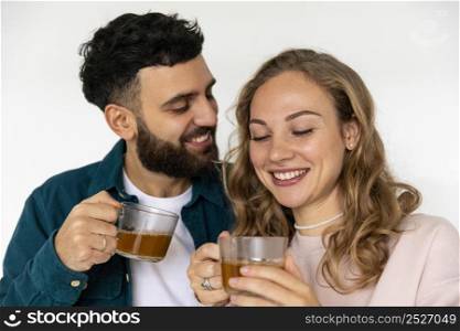cute couple making tea home together