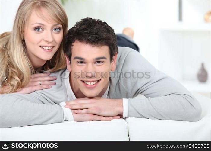 cute couple relaxing at home