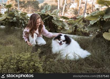 cute dog girl playing garden