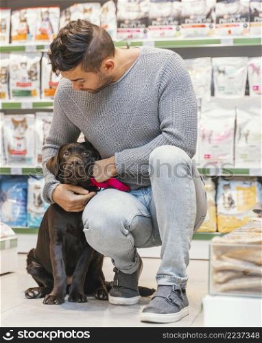 cute dog with owner pet shop