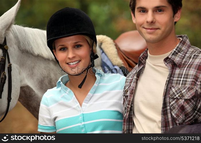 cute female horserider and boyfriend
