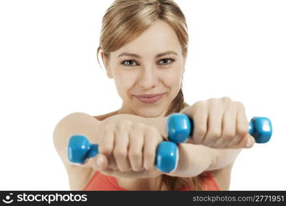 cute fitness woman holding dumbbells. cute fitness woman exercising with blue dumbbells on white background