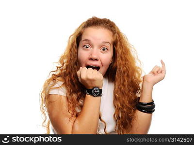 Cute ginger girl surprised, covering her mouth by hand