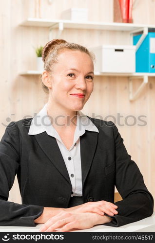 cute girl a company representative with a beautiful smile in the office